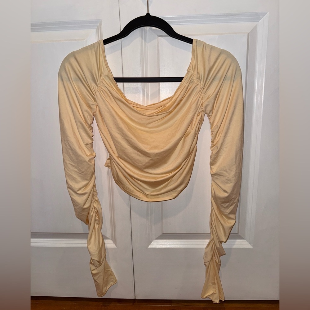Pale long sleeve top